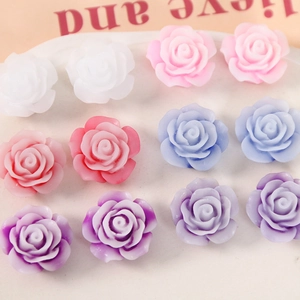 Close-up of 19mm colorful resin rose flower charms for DIY jewelry and crafts making