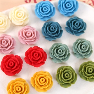 Detail of 20mm matte resin rose flower charms for DIY jewelry and phone case making
