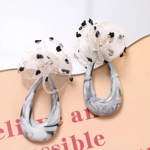 Retro marble texture teardrop earrings with white polka dot mesh flower accents