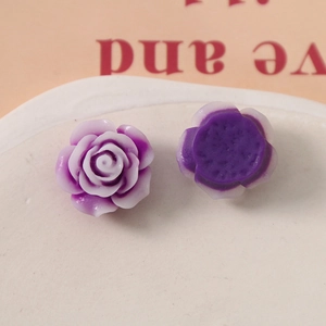 Detail of gradient purple resin rose flower charms showing 3D front and flat back base