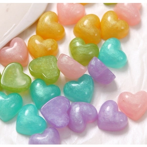 Mix of colorful resin heart beads with glitter finish for DIY jewelry and crafts