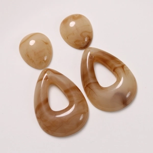 Water-drop geometric resin jewelry parts with amber marble texture in beige brown