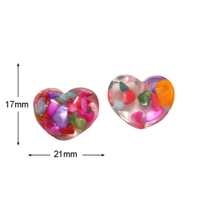 Detail showing 17mm x 21mm heart-shaped transparent resin charms with colorful stones