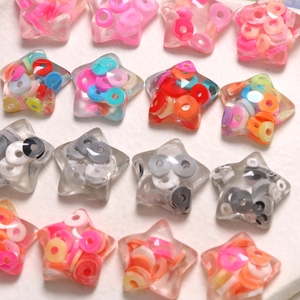 Transparent star resin beads filled with colorful clay discs for DIY jewelry and crafts
