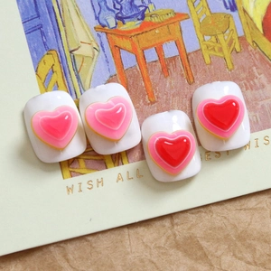 Dolci ciondoli per nail art a cuore 3D in resina con bordo dorato su cartolina decorativa