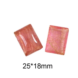 Macro λήψη από ροζ ρητίνη cabochon 25x18mm με χρυσή μεταξωτή υφή και λεπτομέρεια