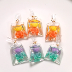 Cute gradient resin bears in liquid waterproof bags with golden rings for DIY crafts