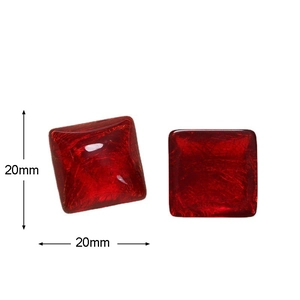 Detail shot of 20mm square red resin charms with gold silk texture for DIY jewelry