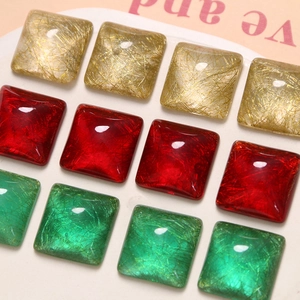 Square silk texture resin cabochons with gold wire inlay in gold, red, and green colors