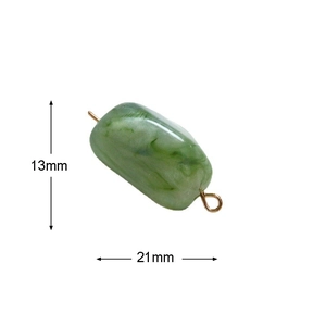 Detailed view of green marble-pattern resin pendant with gold rings and 21x13mm size