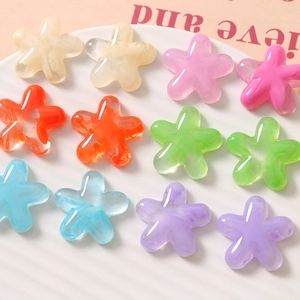 Colorful semi-transparent star-shaped resin charms for DIY jewelry and crafts in soft tones