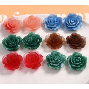 Detail of 22mm resin rose flower charms for DIY jewelry and phone case crafts