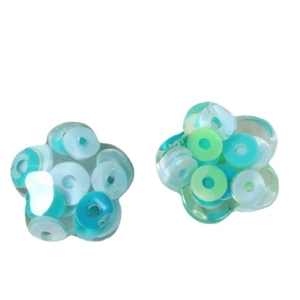Transparent resin flower earrings with colorful sequins in a minimalist summer style