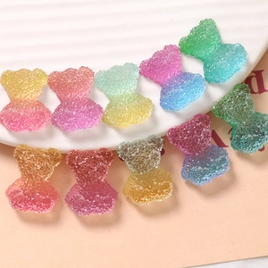 Colorful gradient gummy bear resin charms with frosted sugar texture for DIY crafts