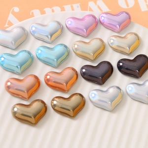 Pearlescent heart-shaped resin charms in multiple colors for DIY jewelry and crafts