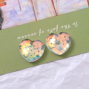 Iridescent heart resin charms with orange floral sequins for DIY jewelry making