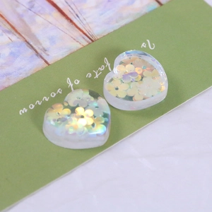 DIY heart resin charms with translucent ice texture and colorful laser flower sequins