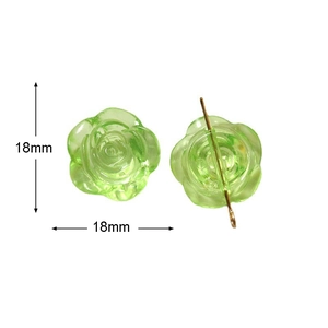 Détail d'une perle rose en résine vert clair de 18mm pour bijoux DIY et accessoires cheveux
