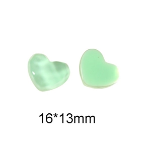 Detail of 16x13mm light green resin heart charms with textured and smooth finishes
