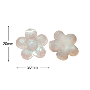 Macro view showing 20mm resin flower charms with pearlescent finish for DIY jewelry