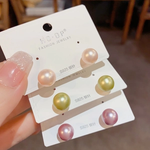 Three pairs of elegant S925 silver pearl stud earrings in pink, green, and purple shades