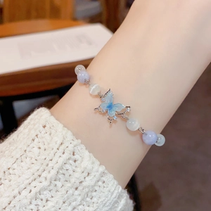 Elegant butterfly cat-eye beaded drawstring bracelet with lavender and cream stones