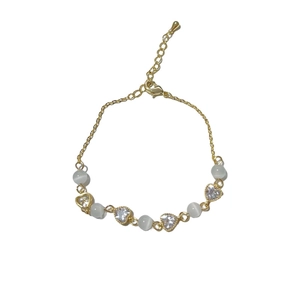 Elegant gold cat eye stone and heart zircon bracelet for women with minimalist style