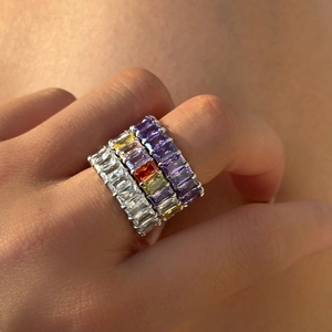 Stackable 18k gold plated titanium rings with multi-color baguette-cut zircons