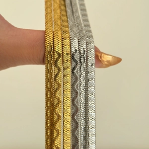 Detail of 18k gold and silver plated 4mm herringbone snake chain necklaces set for women