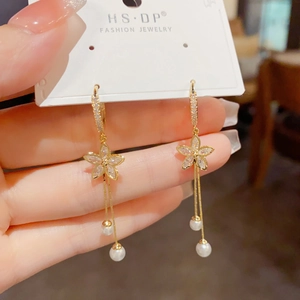 Elegant gold floral drop earrings with sparkling zircon crystals and pearl tassels