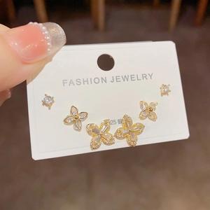 Detail of 6-piece S925 silver stud earring set with sparkling flower and clover designs