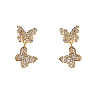 Sparkling double butterfly dangle earrings with cubic zirconia in gold plated finish