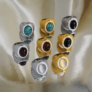 Vintage 18k gold plated rings with colorful oval stones and hammered metal texture