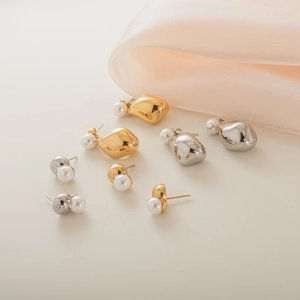 Gothic vintage pearl stud earrings in gold and silver finish for a modern commute style