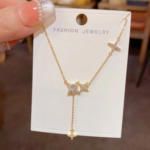 Exquisite gold star tassel necklace with sparkling cubic zirconia pendant on elegant chain