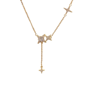 Elegant gold star tassel necklace with zircon stones and Y-shaped chain design