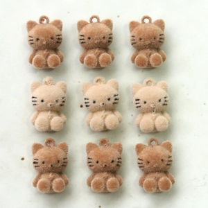 3x3 grid of cute flocked cat pendants for DIY jewelry in beige and brown colors
