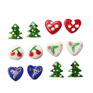 Assorted DIY glass beads featuring cherry patterns in heart, star, and round shapes