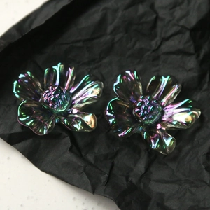 Macro shot of 3D iridescent daisy flower petals with radiant texture for DIY jewelry