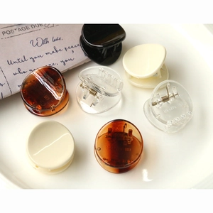 Mini geometric resin hair claw clips set in tortoiseshell, white and clear finishes