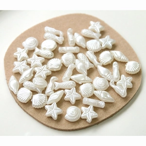 Pearlescent starfish and seashell beads for DIY jewelry and crafts, various sea shapes