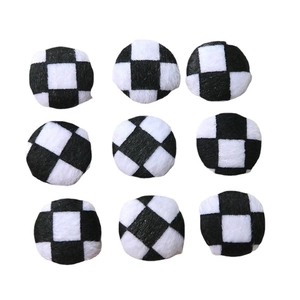 Nine black and white checkered plush round charms for DIY crafts and coat accessories