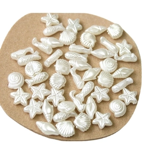Marine theme pearl white starfish and seashell DIY accessories on a round base