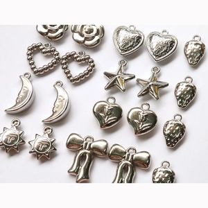 Silver vintage alloy charms set with hearts, stars and moons for DIY jewelry making