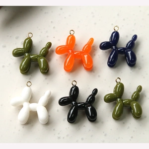 Set of 3D resin balloon dog charms in six vibrant colors with golden metal rings