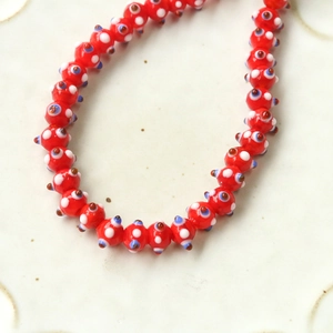 Red Evil Eye glass beads strand with blue and white polka dots for DIY jewelry making
