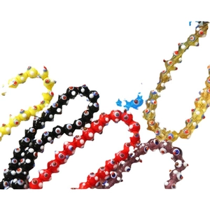 Colorful evil eye glass beads in assorted vibrant colors for DIY jewelry making