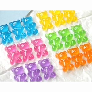 Macro shot of colorful translucent resin bear charms for DIY jewelry and phone cases