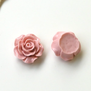 Detailed front and back view of pink resin rose flower charms for DIY jewelry making