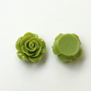 Detailed macro view of olive green resin rose charms with flat back for DIY crafts